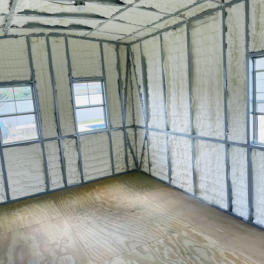 Closed-cell spray foam insulation applied to wall cavities in a residential project in Baltimore